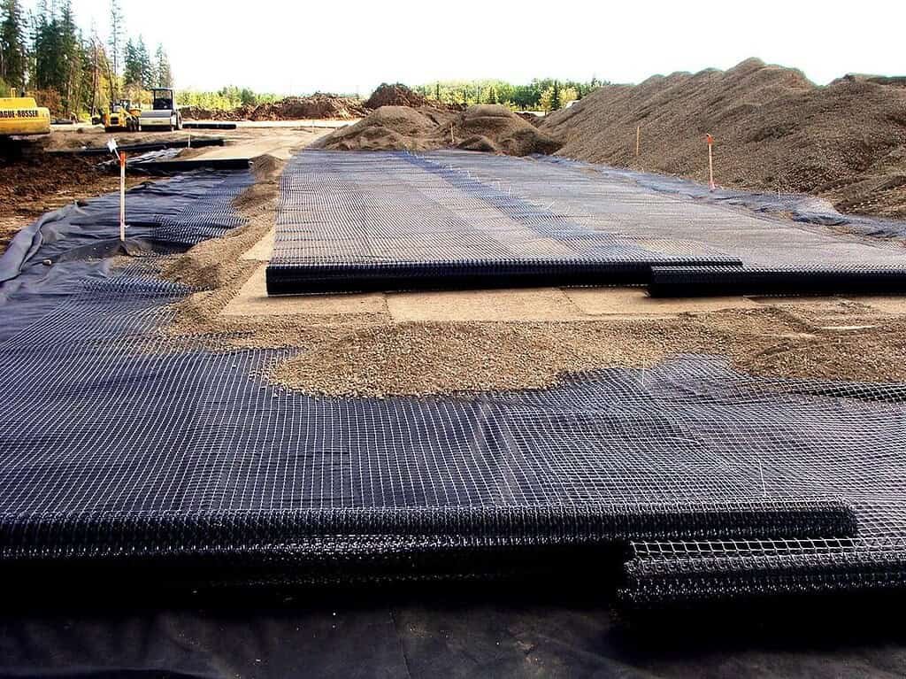 Biaxial geogrid roadbed reinforcement